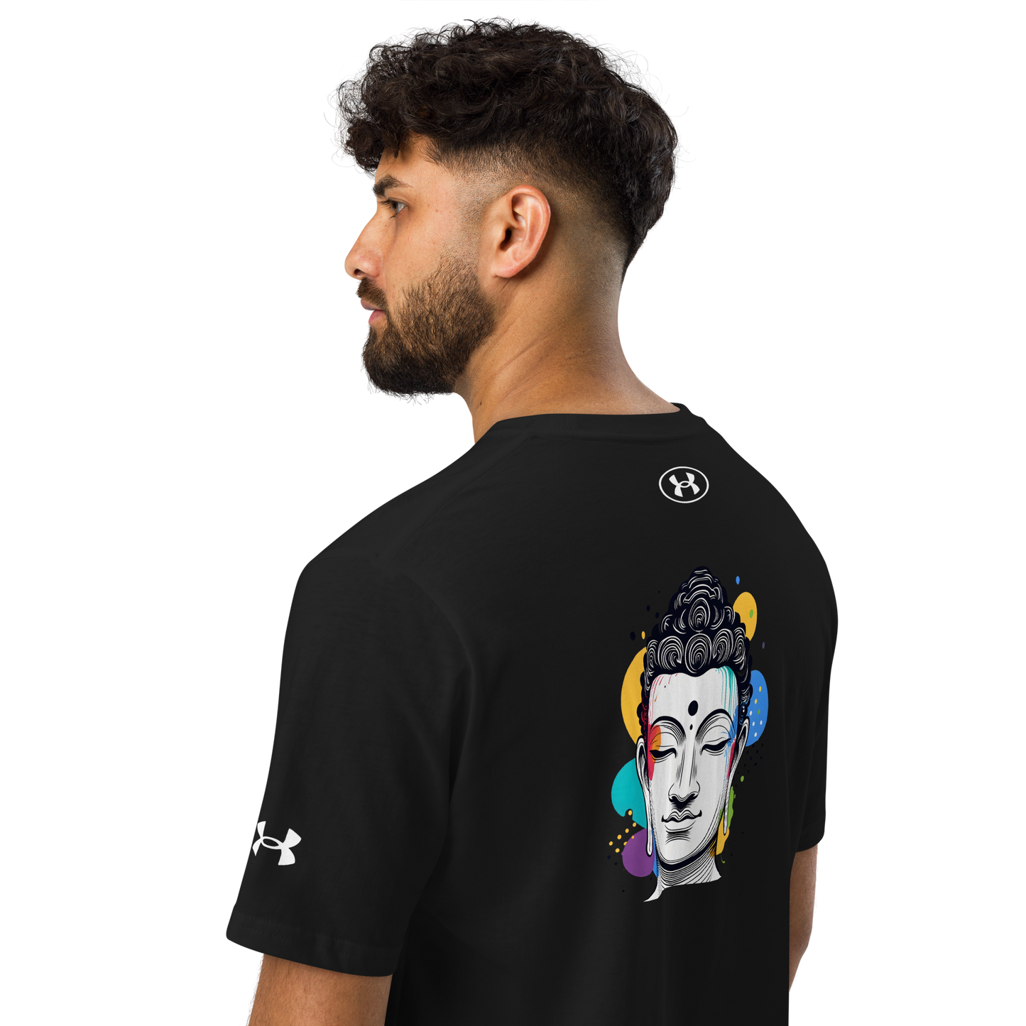 Back view of a man in a black Under Armour t-shirt featuring a colorful Buddha design, promoting mindfulness and zen.