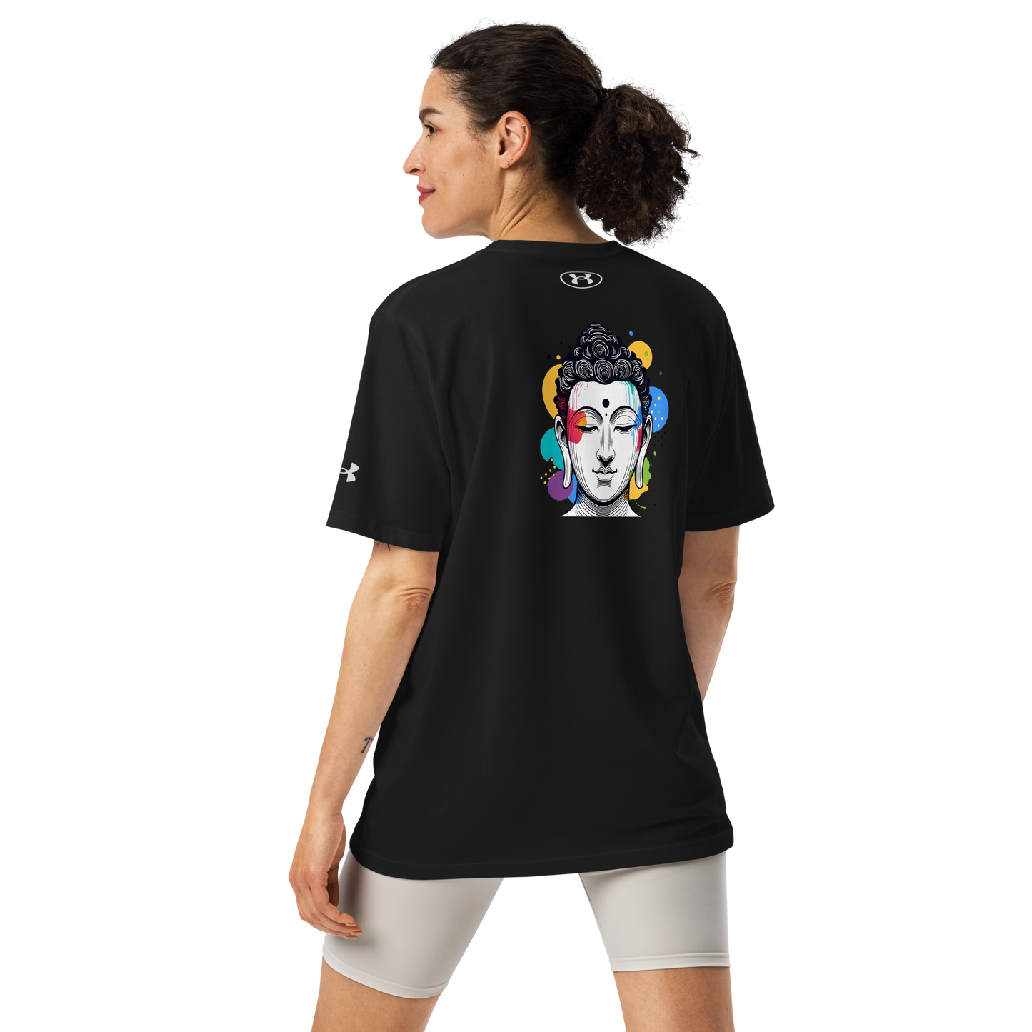 Woman wearing Under Armour athletic t-shirt Contemplation with Buddha graphic, blending fitness and mindfulness.